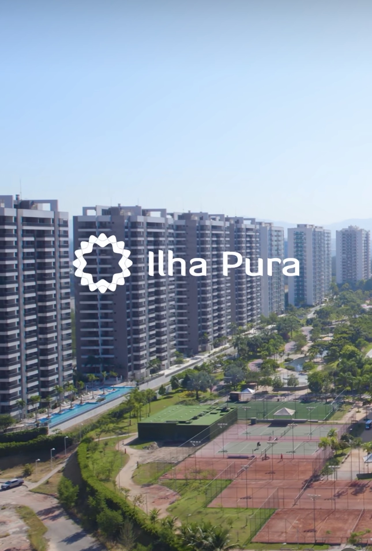 Vista aérea do bairro planejado Ilha Pura com parques, lagos e infraestrutura moderna